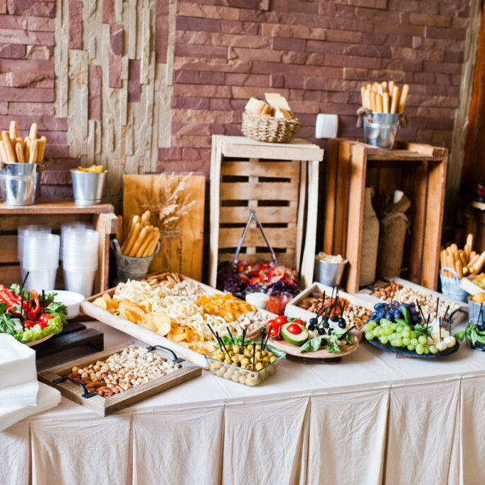 Great variety of different multicolored snacks on the wedding buffet.